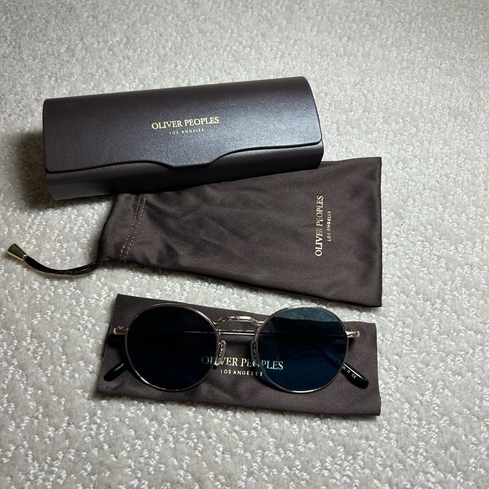 Oliver Peoples Gold Frame Sunglasses with Black Lenses